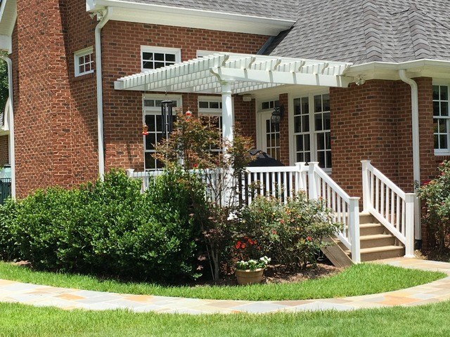 8630 East Hopewell Road Musella, GA 31066 - Photo 23 of 28 a front view of a house with a garden