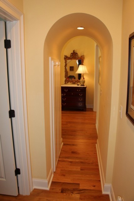 8630 East Hopewell Road Musella, GA 31066 - Photo 4 of 28 a view of a hallway with wooden floor and a bathroom