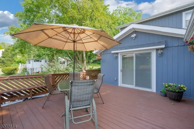 a view of a chair and table in the patio