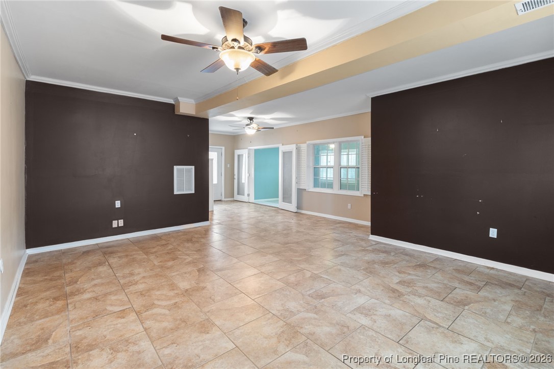 150 Old Vander Road Fayetteville, NC 28312 - Photo 19 of 38 a view of a livingroom with a ceiling fan and window