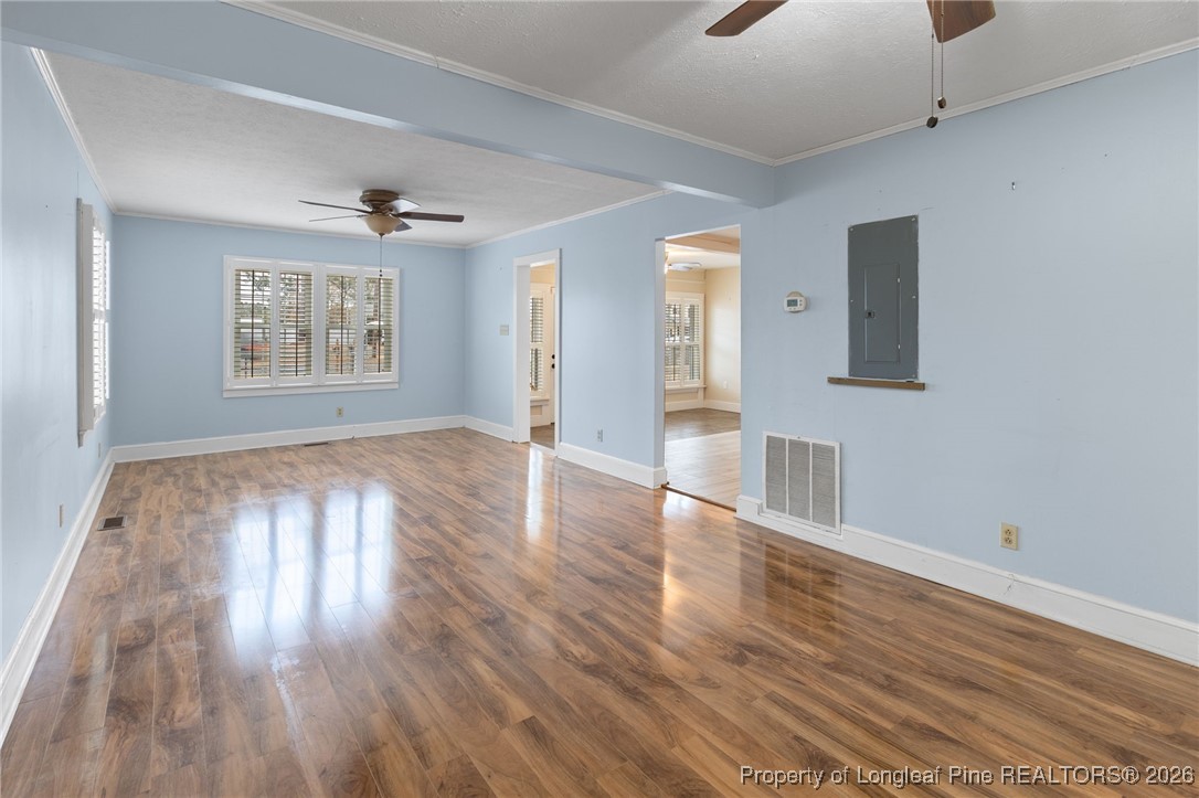 150 Old Vander Road Fayetteville, NC 28312 - Photo 26 of 38 a view of an empty room with wooden floor and a window