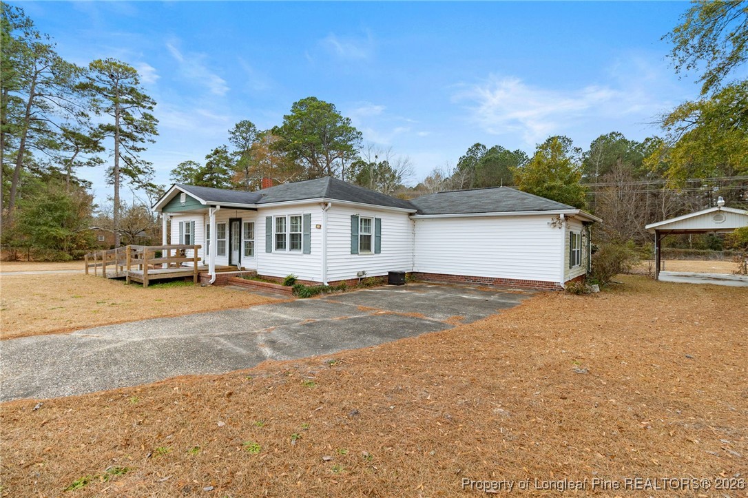 150 Old Vander Road Fayetteville, NC 28312 - Photo 32 of 38 a view of a house with a patio