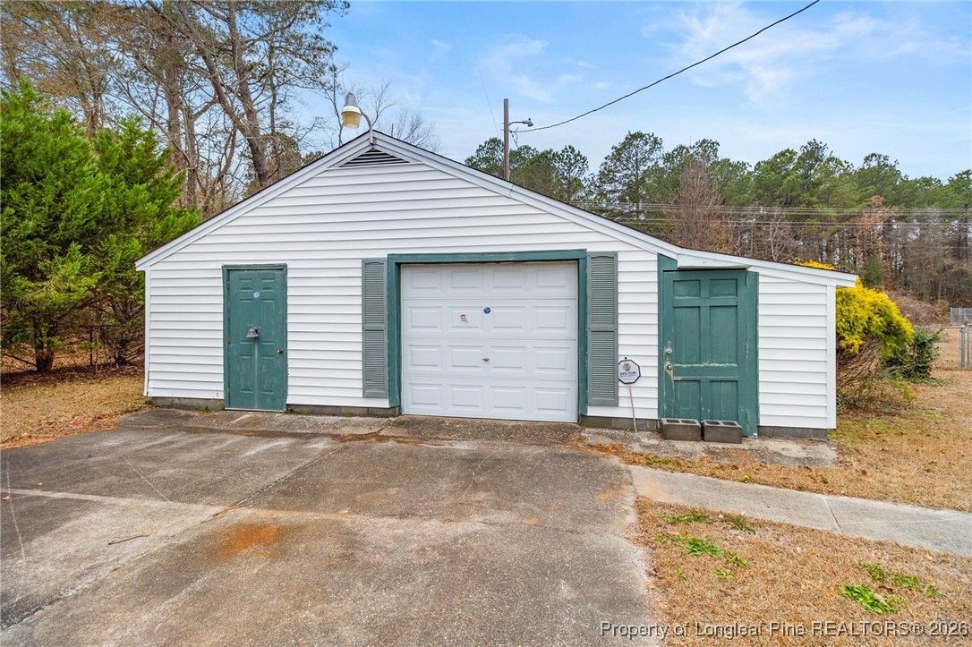 150 Old Vander Road Fayetteville, NC 28312 - Photo 37 of 38 a view of a house with a garage