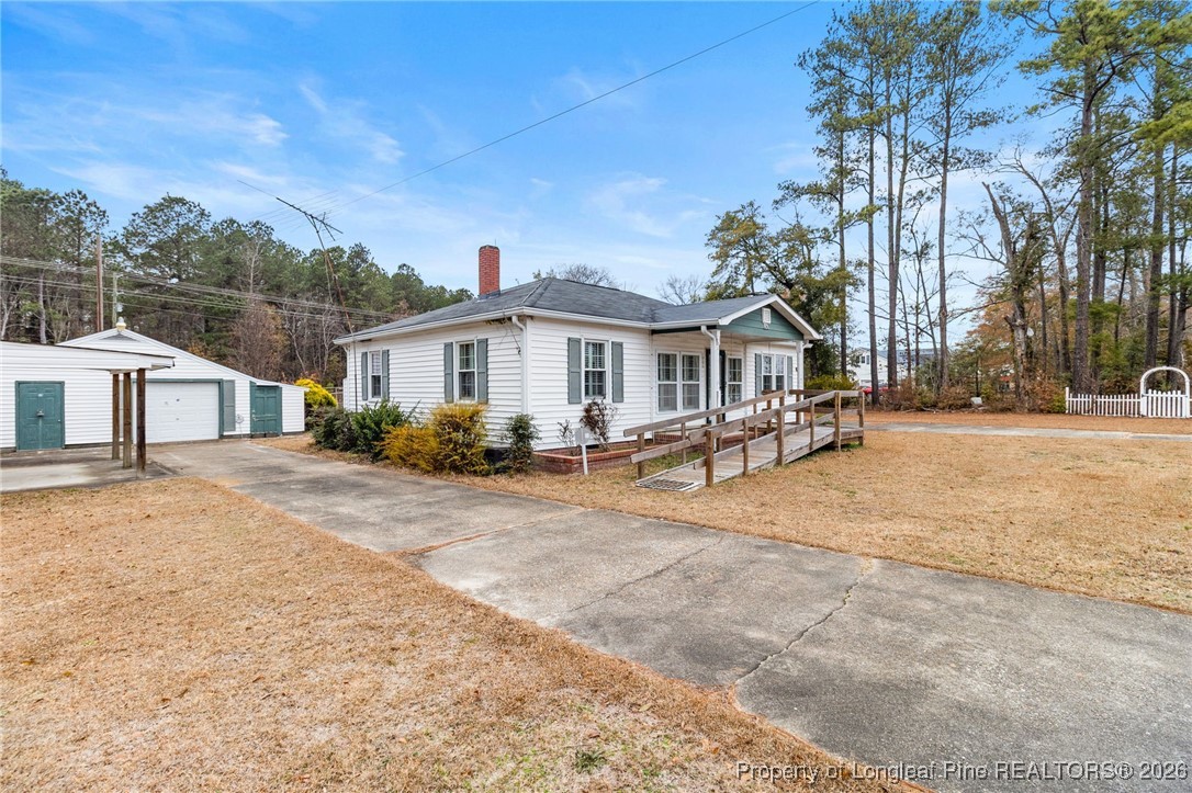 150 Old Vander Road Fayetteville, NC 28312 - Photo 4 of 38 a view of a house with a patio