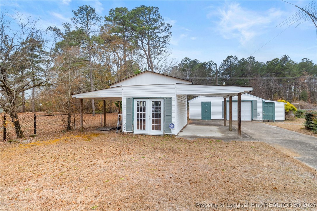 150 Old Vander Road Fayetteville, NC 28312 - Photo 5 of 38 front view of a house with a yard