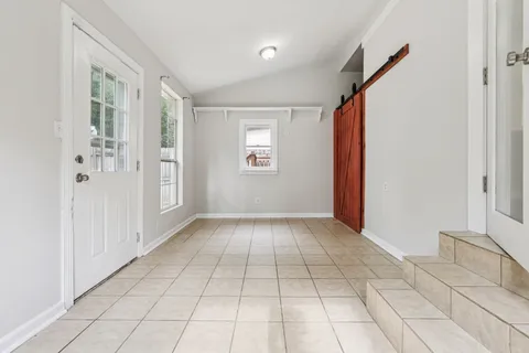a view of an empty room and window