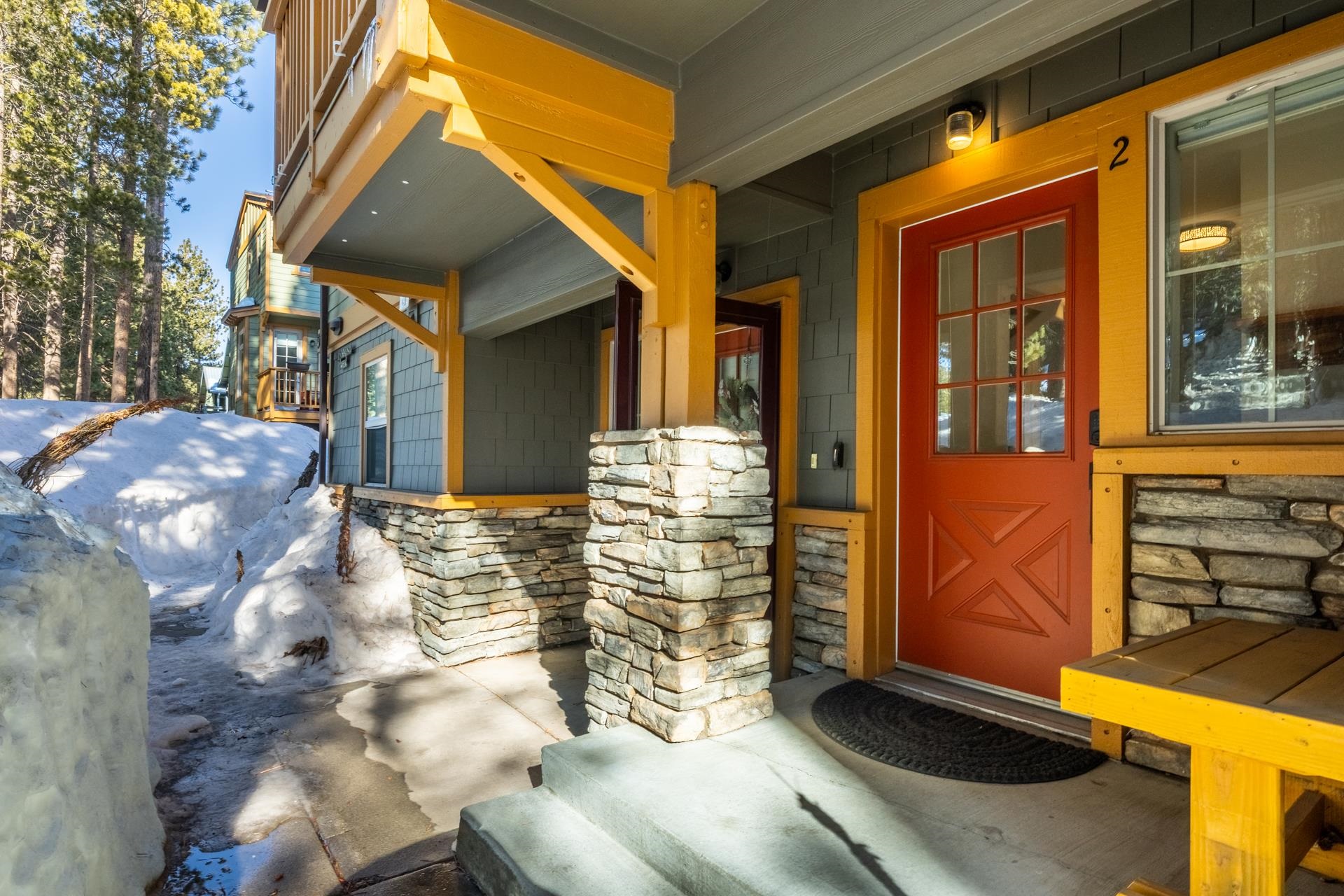 525 Manzanita Road, Unit 2 Mammoth Lakes, CA 93546 - Photo 26 of 28 Entrance to property with stone siding and a porch
