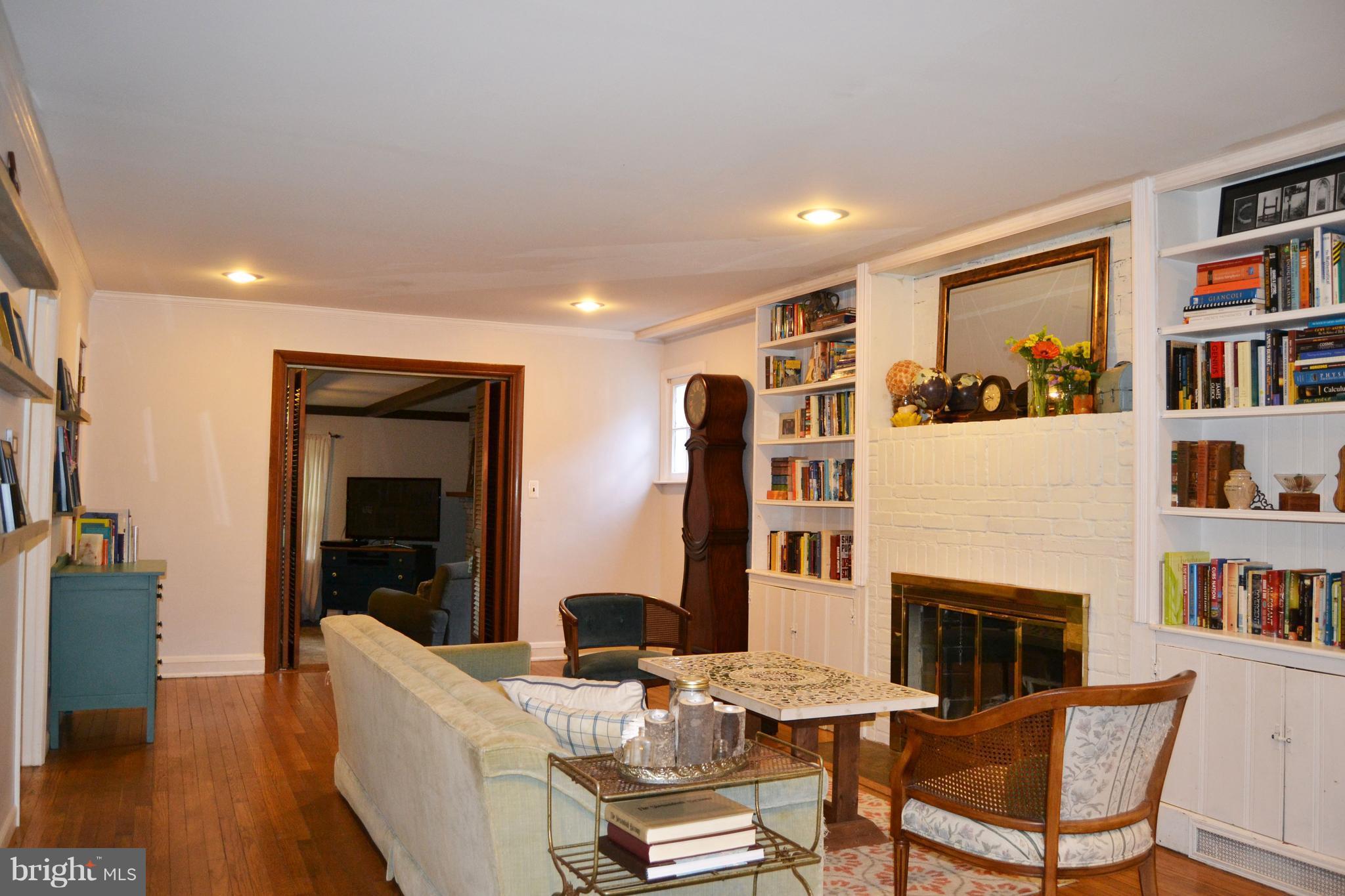 3647 Campfield Road Baltimore, MD 21207 - Photo 3 of 30 Large living room with fireplace
