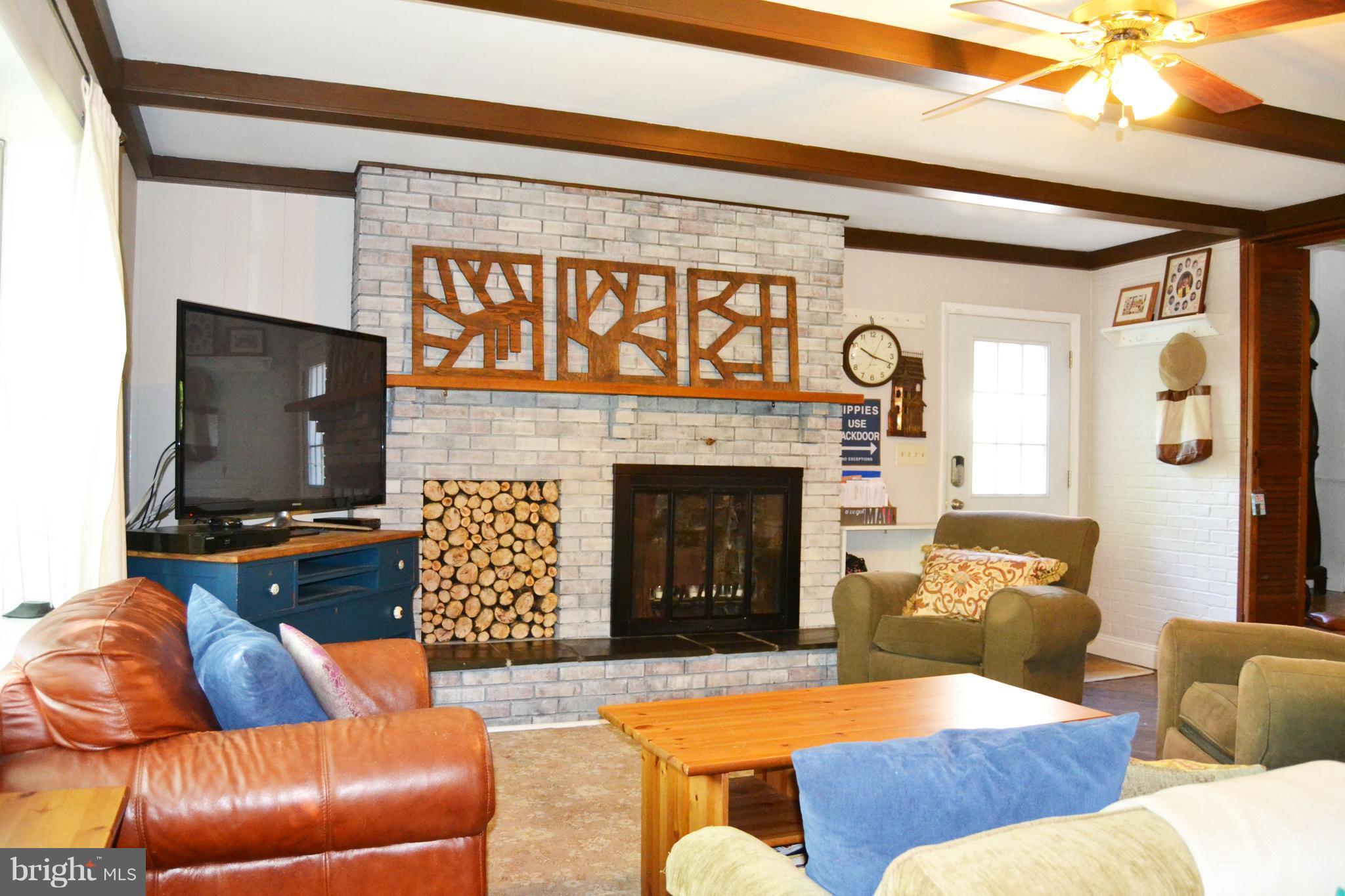 3647 Campfield Road Baltimore, MD 21207 - Photo 8 of 30 Enjoy cozy evenings by the fireplace
