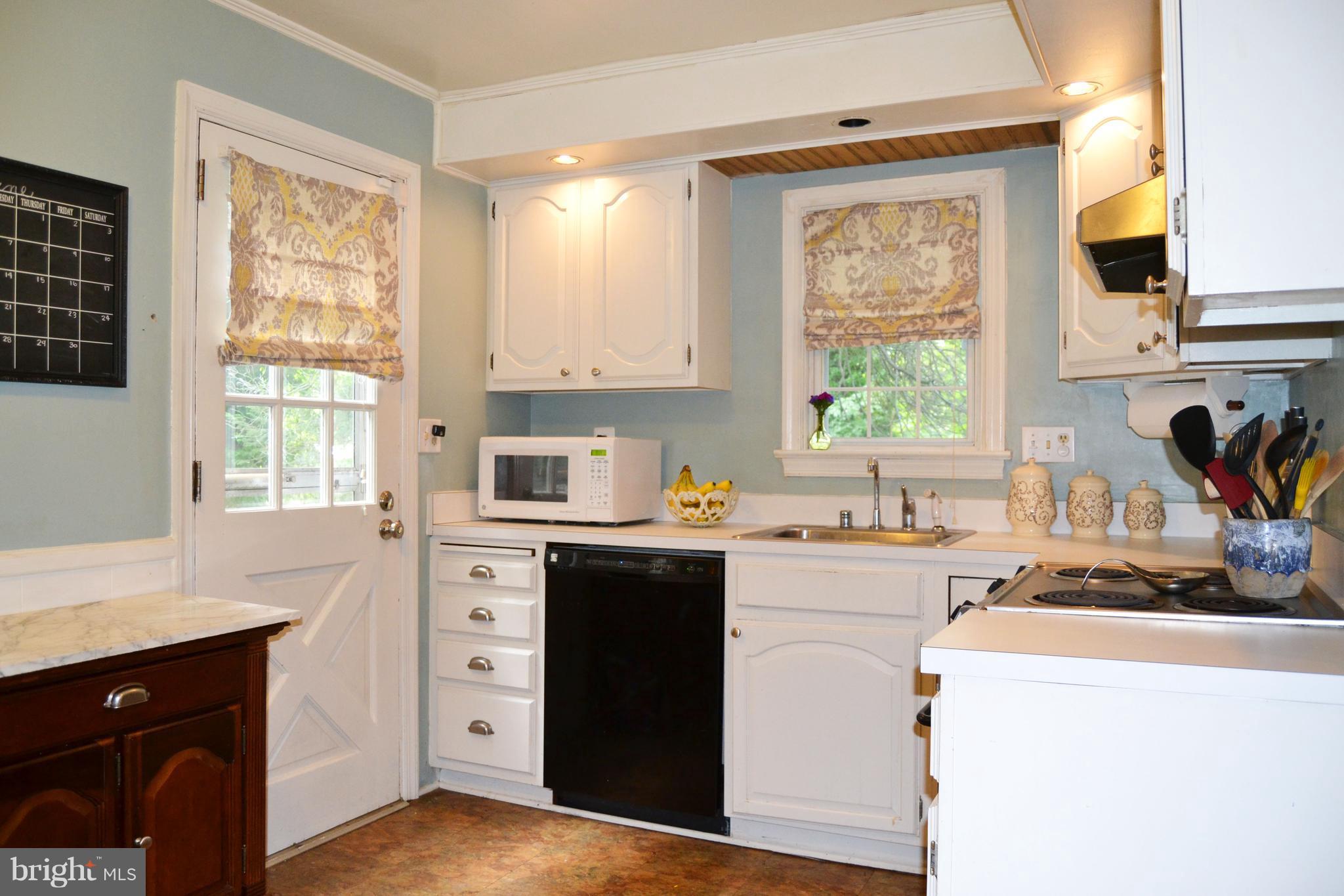 3647 Campfield Road Baltimore, MD 21207 - Photo 9 of 30 Updated Kitchen with door to yard