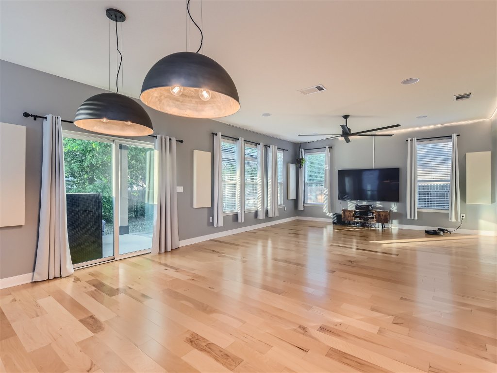 7601 Rio Pass Austin, TX 78724 - Photo 2 of 11 a view of a living room a chandelier and living room