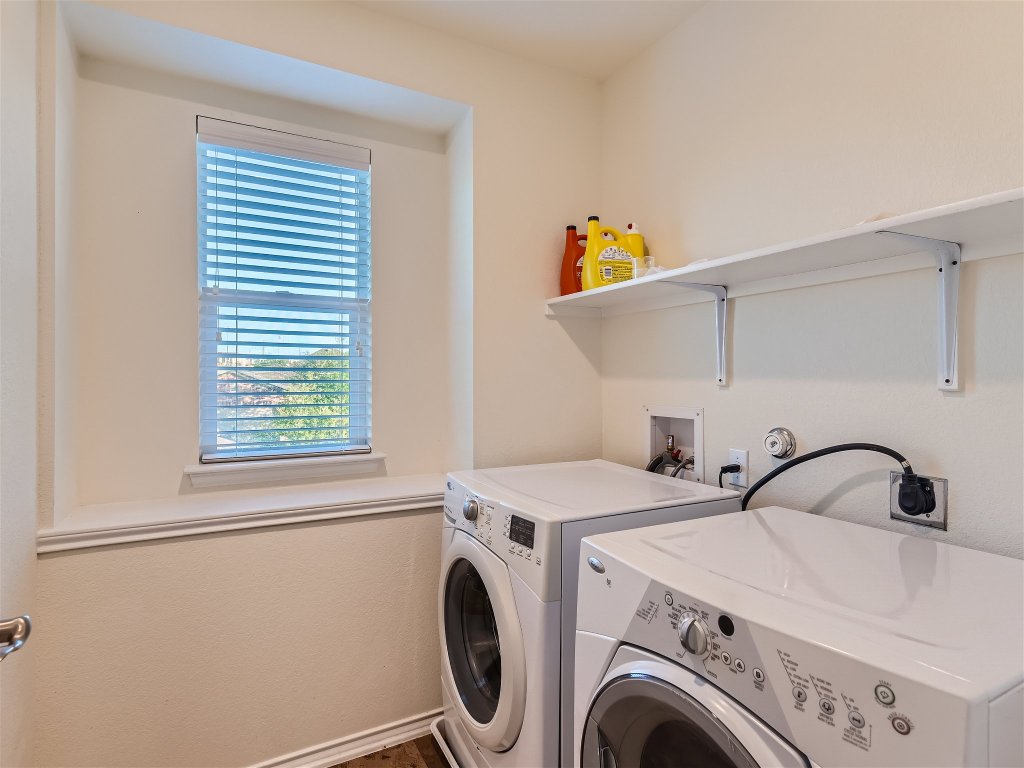 7601 Rio Pass Austin, TX 78724 - Photo 10 of 11 a utility room with dryer and washer