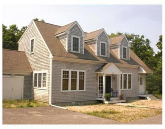 333 Service Road, Unit 2 Sandwich, MA 02537 - Photo 1 of 8 a front view of a house