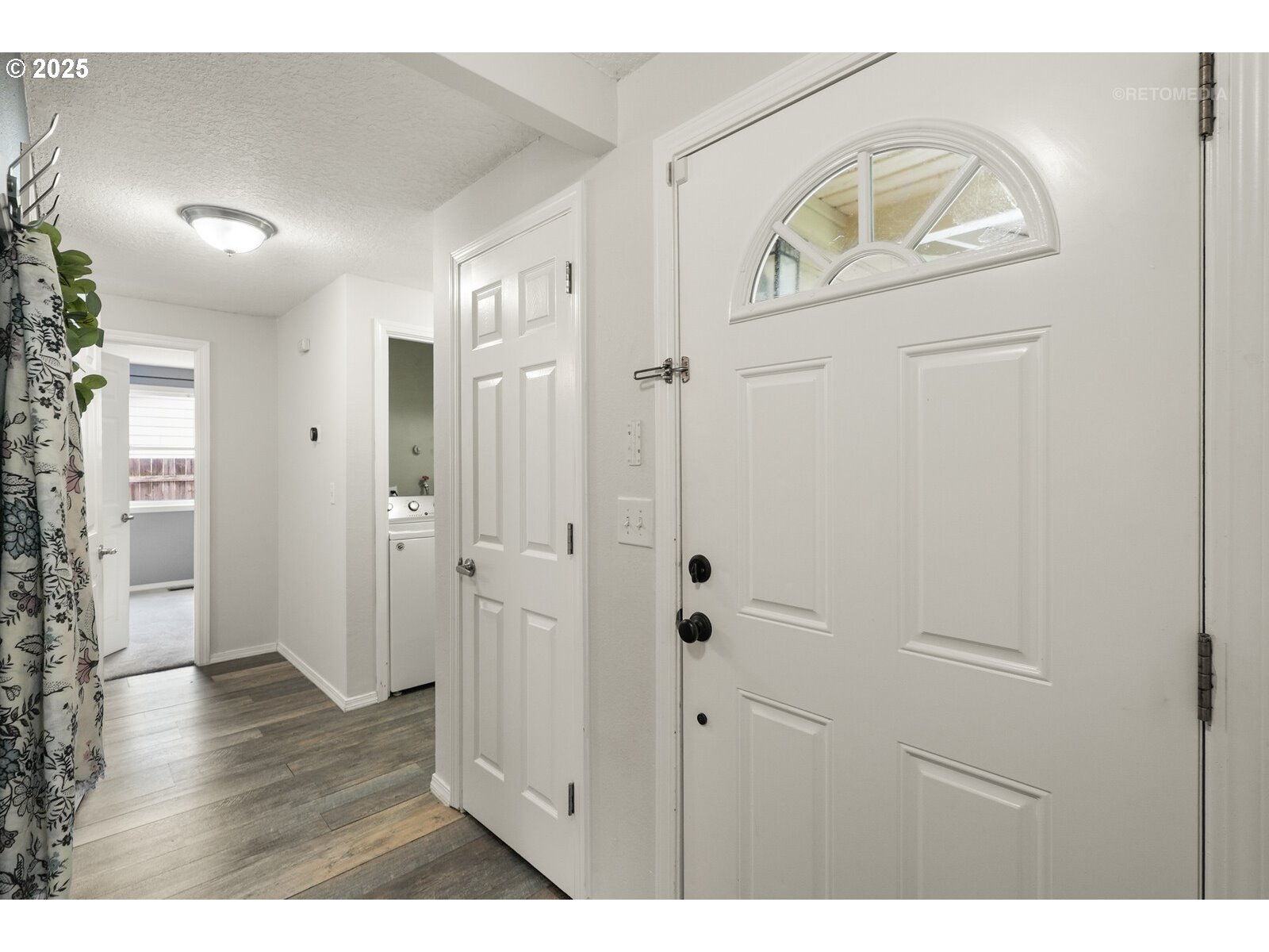 20490 Southwest Frances Street Beaverton, OR 97003 - Photo 16 of 32 a view of entryway with wooden floor