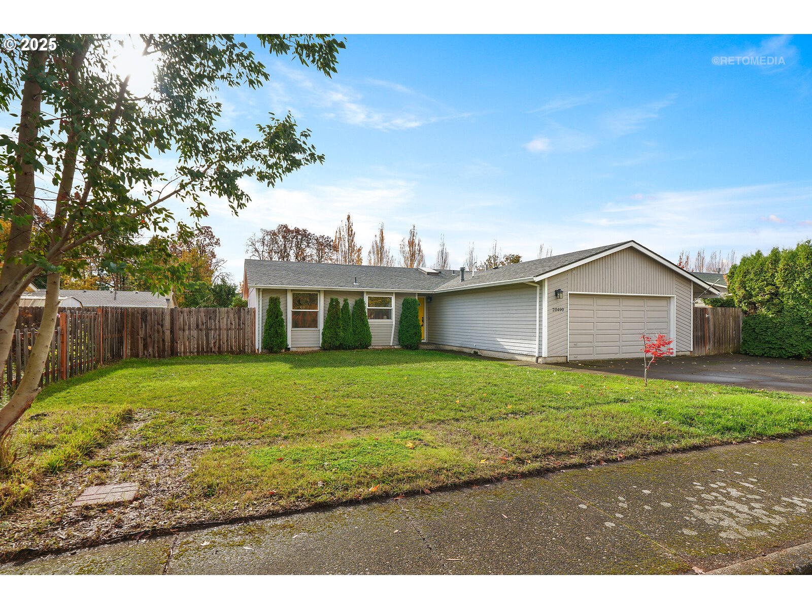 20490 Southwest Frances Street Beaverton, OR 97003 - Photo 2 of 32 a view of a yard in front of a house with a yard