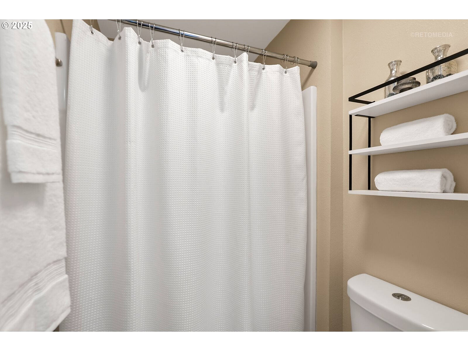20490 Southwest Frances Street Beaverton, OR 97003 - Photo 21 of 32 a bathroom with a shower curtain and a sink