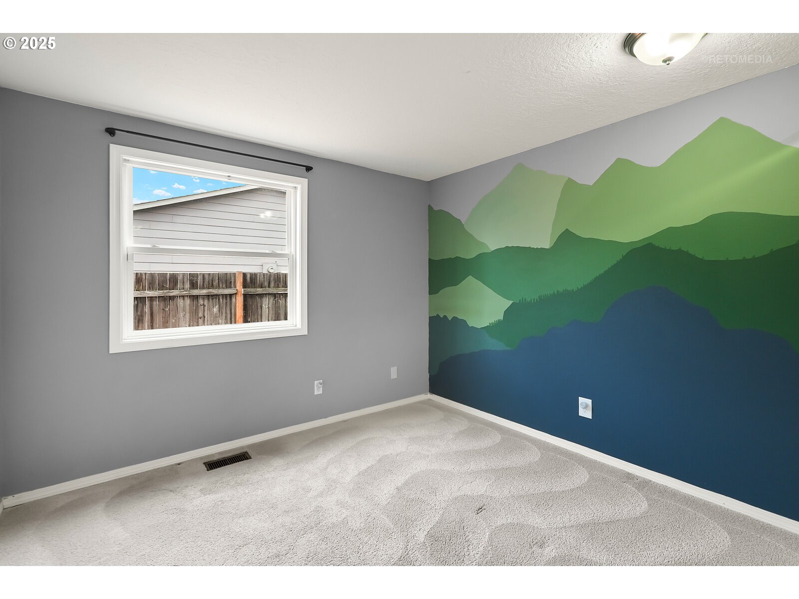 20490 Southwest Frances Street Beaverton, OR 97003 - Photo 22 of 32 a view of an empty room with a window