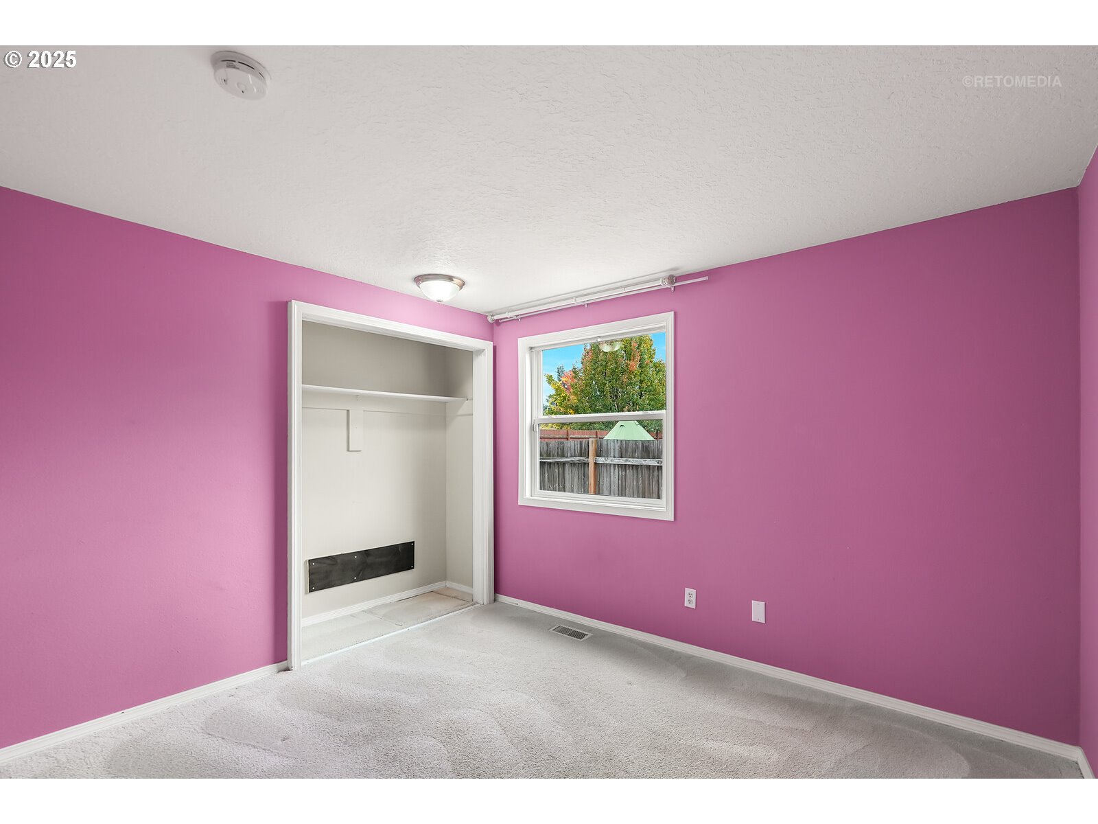 20490 Southwest Frances Street Beaverton, OR 97003 - Photo 25 of 32 a view of a livingroom with an empty space and window