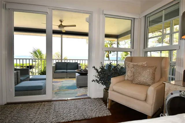 a dining table with a view of living room