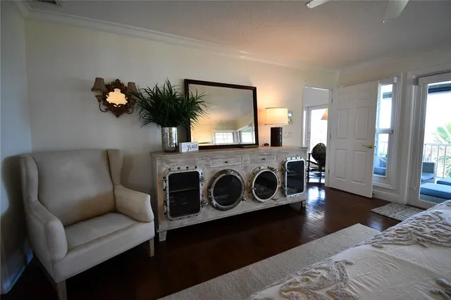 a kitchen with sink and refrigerator