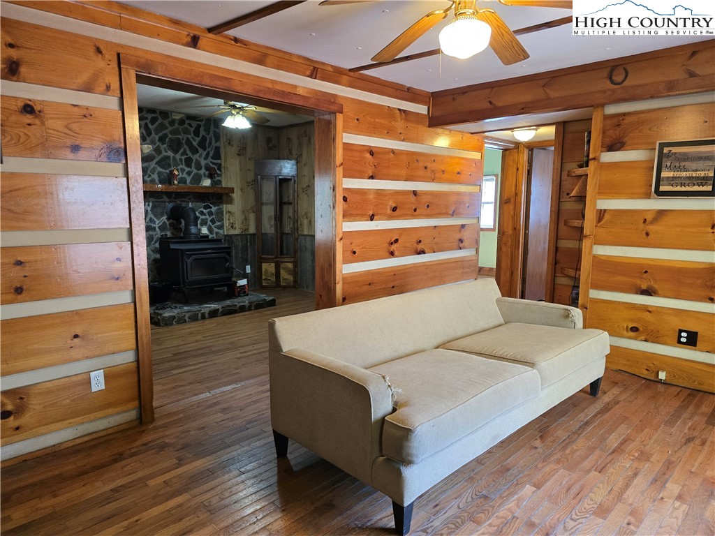3160 Roundabout Road Creston, NC 28615 - Photo 15 of 50 a large room with a bed and a mirror
