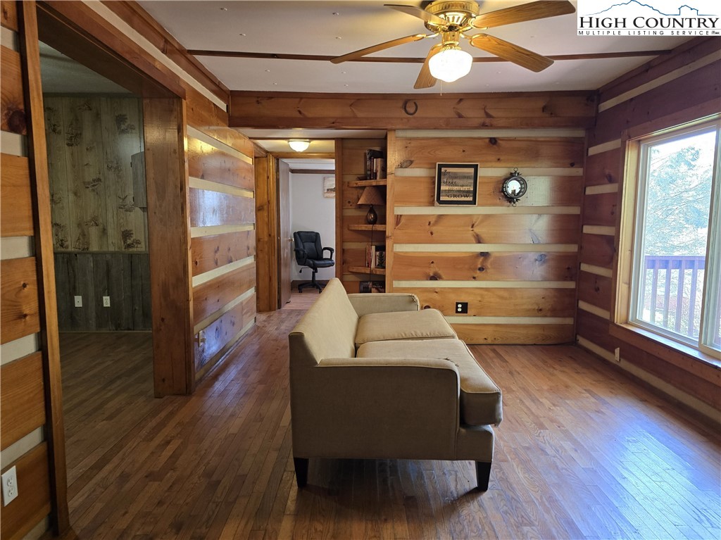 3160 Roundabout Road Creston, NC 28615 - Photo 16 of 50 a room with furniture and a chandelier
