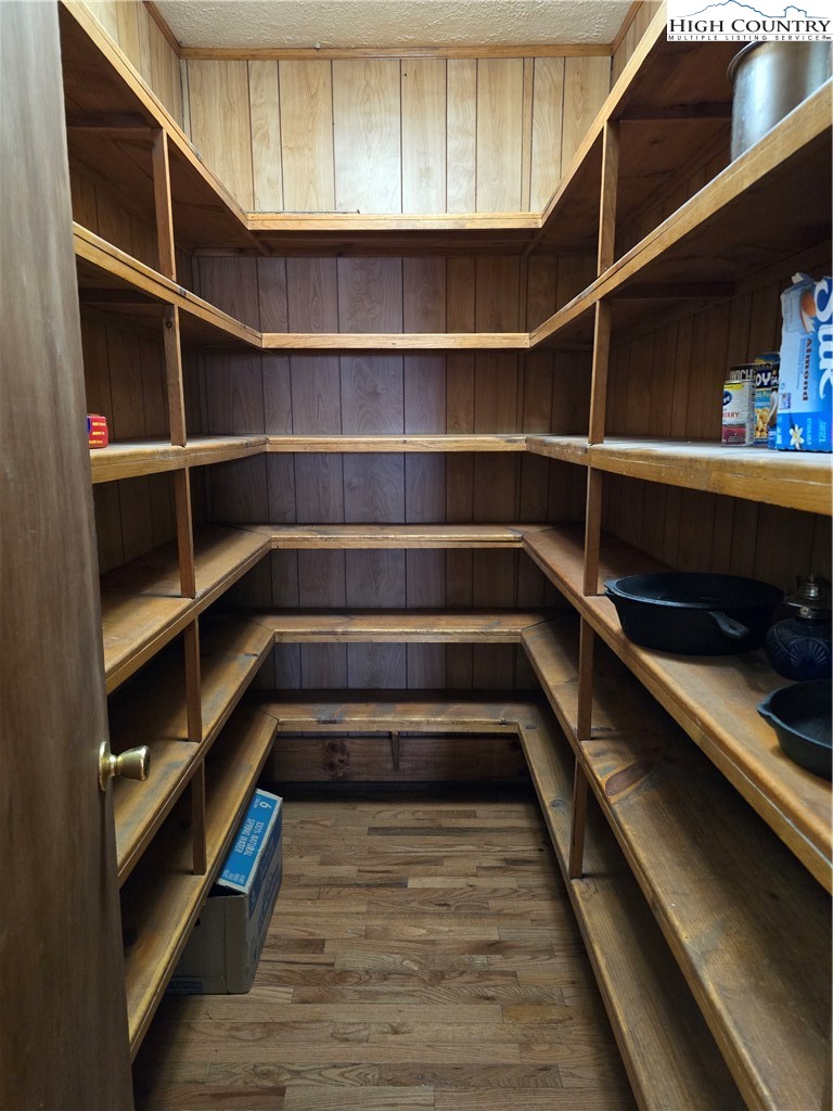 3160 Roundabout Road Creston, NC 28615 - Photo 20 of 50 a view of walk in closet with empty racks