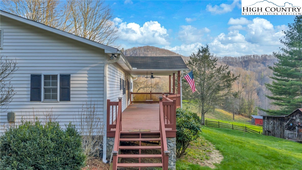 3160 Roundabout Road Creston, NC 28615 - Photo 50 of 50 a view of a house with a yard