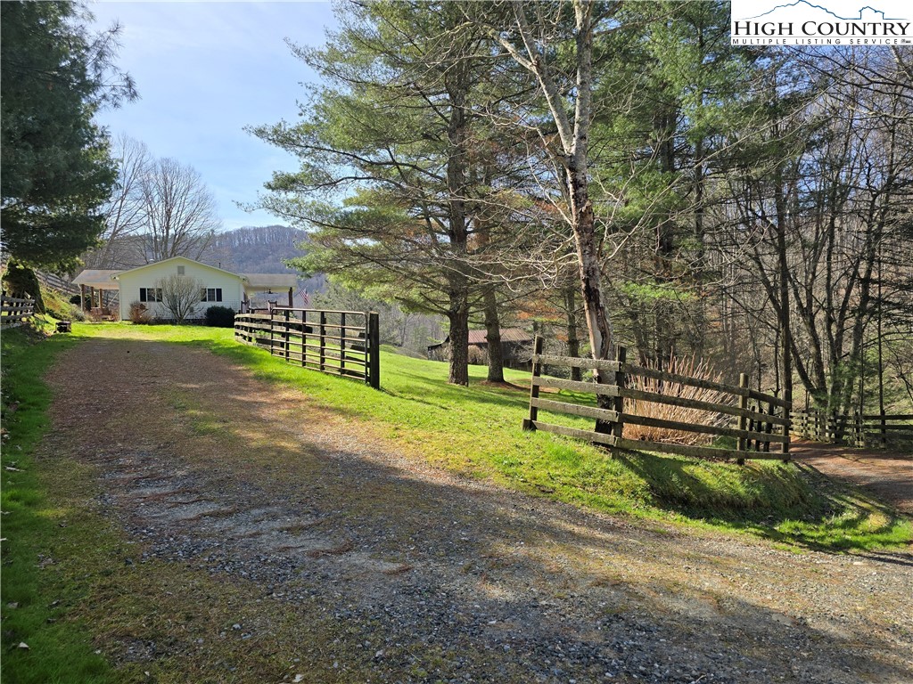 3160 Roundabout Road Creston, NC 28615 - Photo 5 of 50 a view of a park with large trees