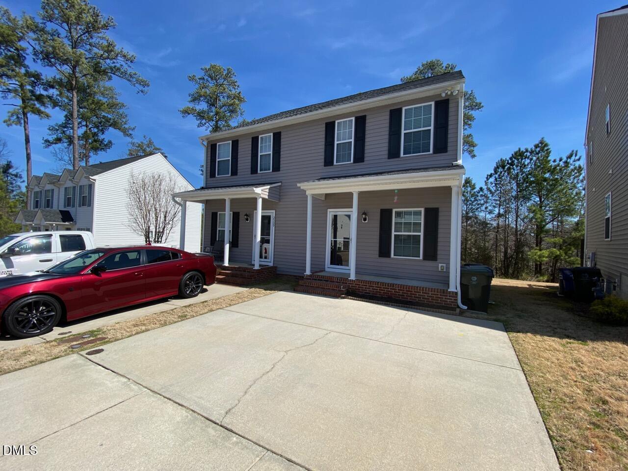 2513 Bay Harbor Drive Raleigh, NC 27604 - Photo 2 of 19 a front view of a house with yard