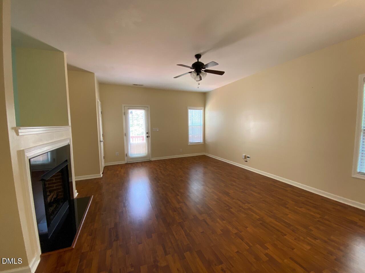 2513 Bay Harbor Drive Raleigh, NC 27604 - Photo 9 of 19 a view of empty room with wooden floor and fan