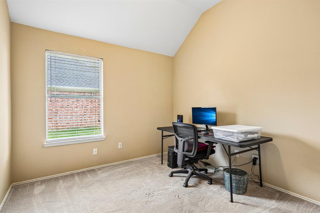 2705 Burning Tree McKinney, TX 75072 - Photo 25 of 35 a view of a workspace with furniture and a window