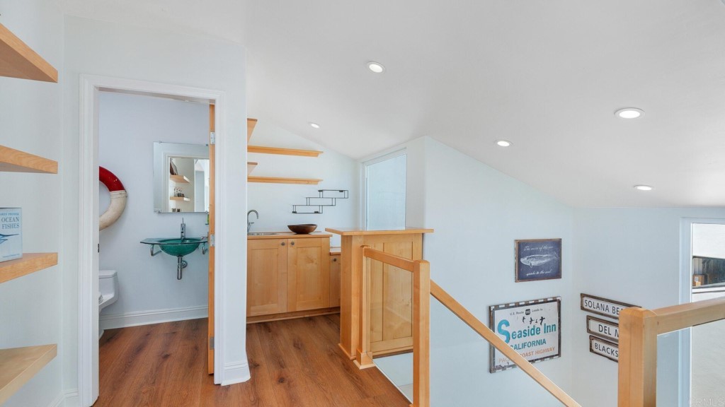 365 Longden Lane Solana Beach, CA 92075 - Photo 14 of 26 a view of hallway with wooden floor and stairs