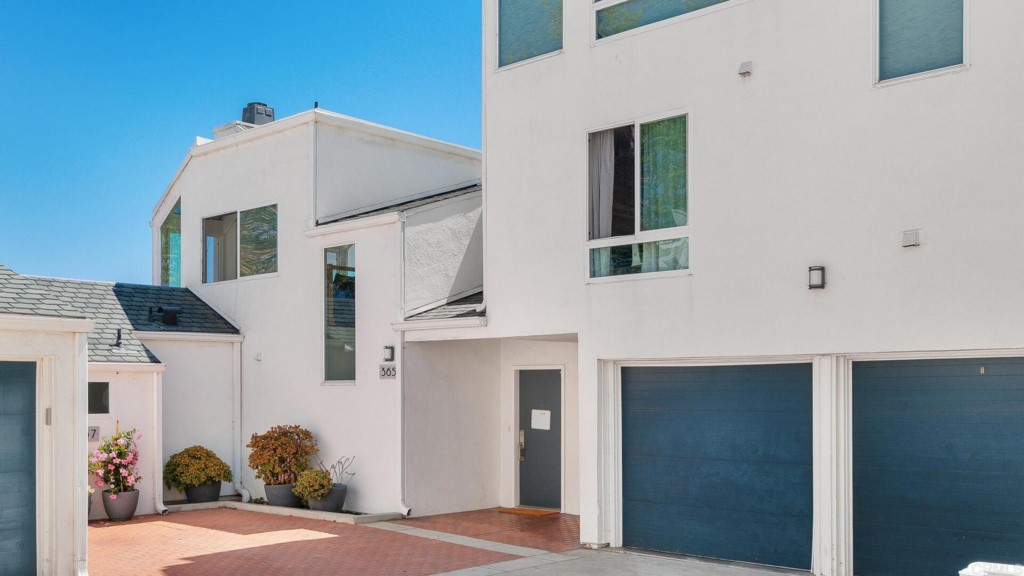 365 Longden Lane Solana Beach, CA 92075 - Photo 19 of 26 a front view of a house with a garage