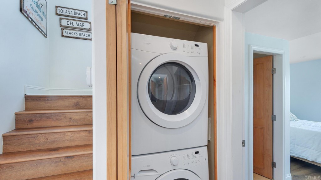 365 Longden Lane Solana Beach, CA 92075 - Photo 20 of 26 a view of a hallway with washer and dryer