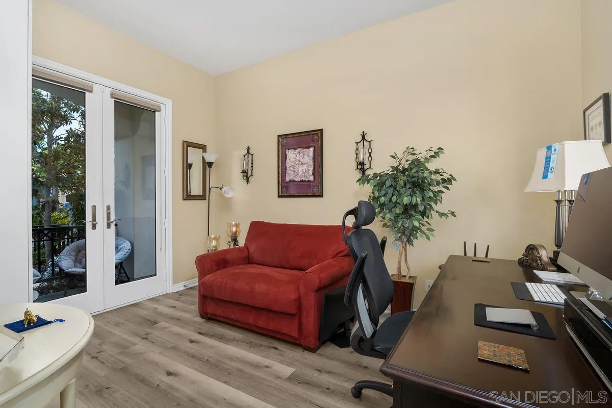 2124 Historic Decatur Road San Diego, CA 92106 - Photo 23 of 40 a living room with furniture and a flat screen tv