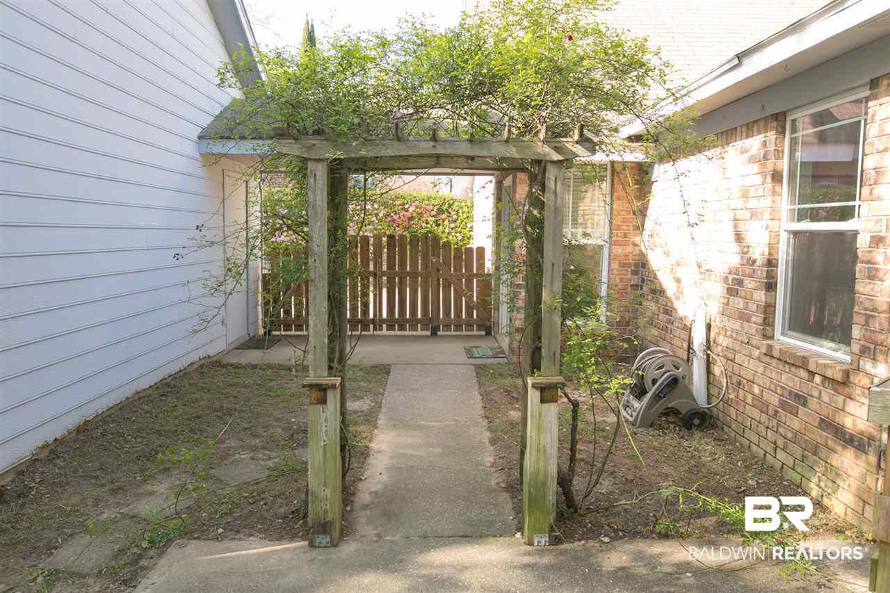 81 Caisson Trace Daphne, AL 36527 - Photo 30 of 40 Sidewalk from Patio