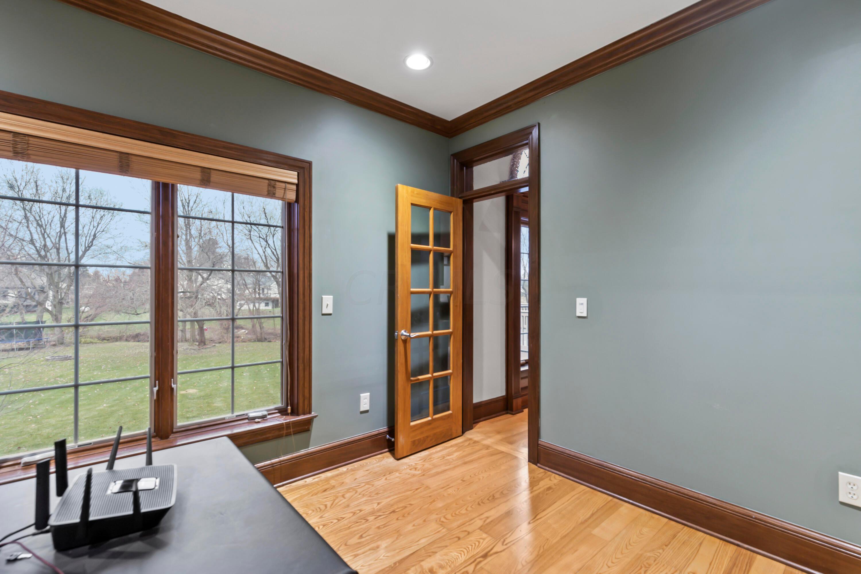 6043 Dublin Road Delaware, OH 43015 - Photo 21 of 98 • Hardwood flooring
• Sage painted walls
• Built-in bookcases & desk
• Crown molding
• 2” blinds