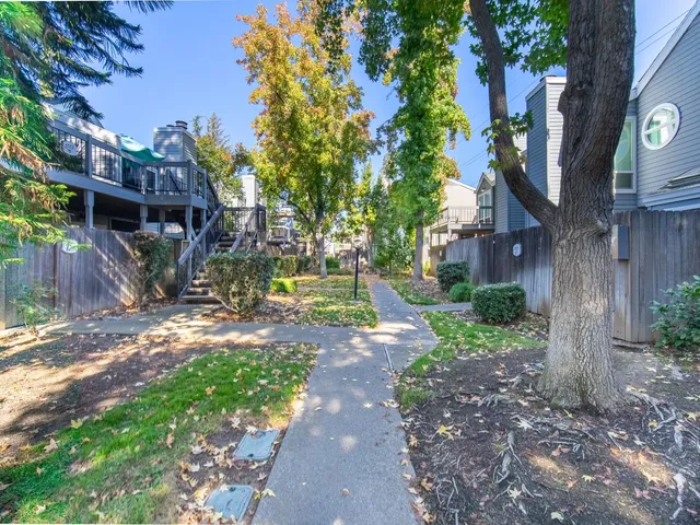 a view of a back yard of the house