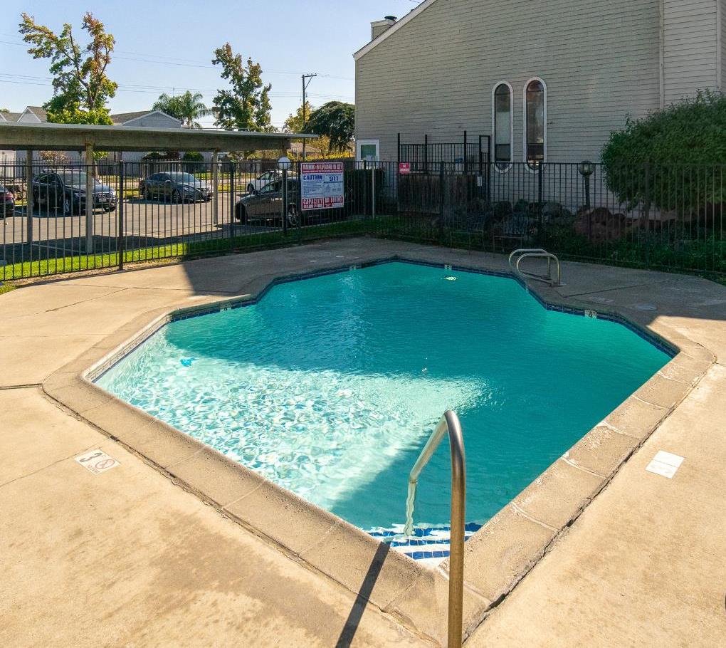 1519 Hood Road, Unit F Sacramento, CA 95825 - Photo 25 of 28 a view of a swimming pool with a patio