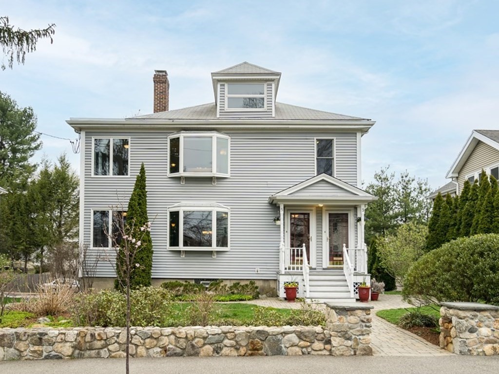 13-15 Fordham Road Newton, MA 02465 - Photo 1 of 30 a front view of a house with a yard