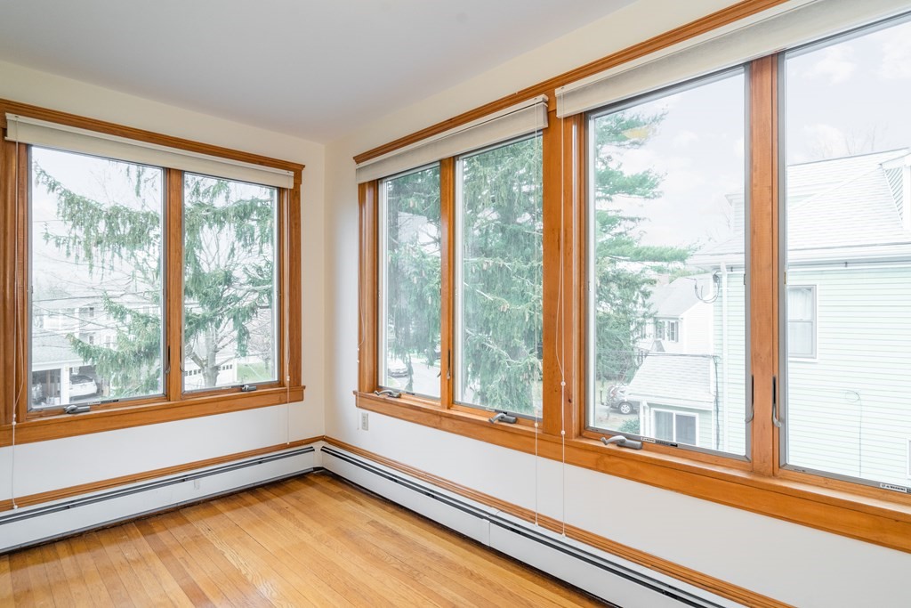 13-15 Fordham Road Newton, MA 02465 - Photo 14 of 30 a view of a room that has a large window