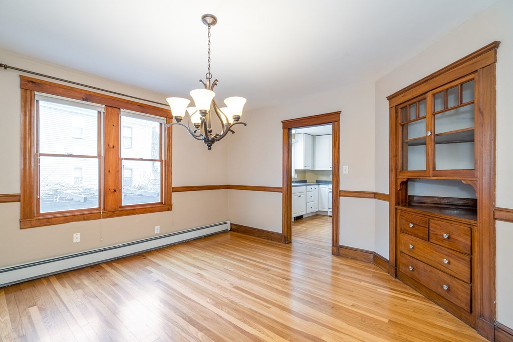 13-15 Fordham Road Newton, MA 02465 - Photo 6 of 30 a view of livingroom with hardwood floor and window