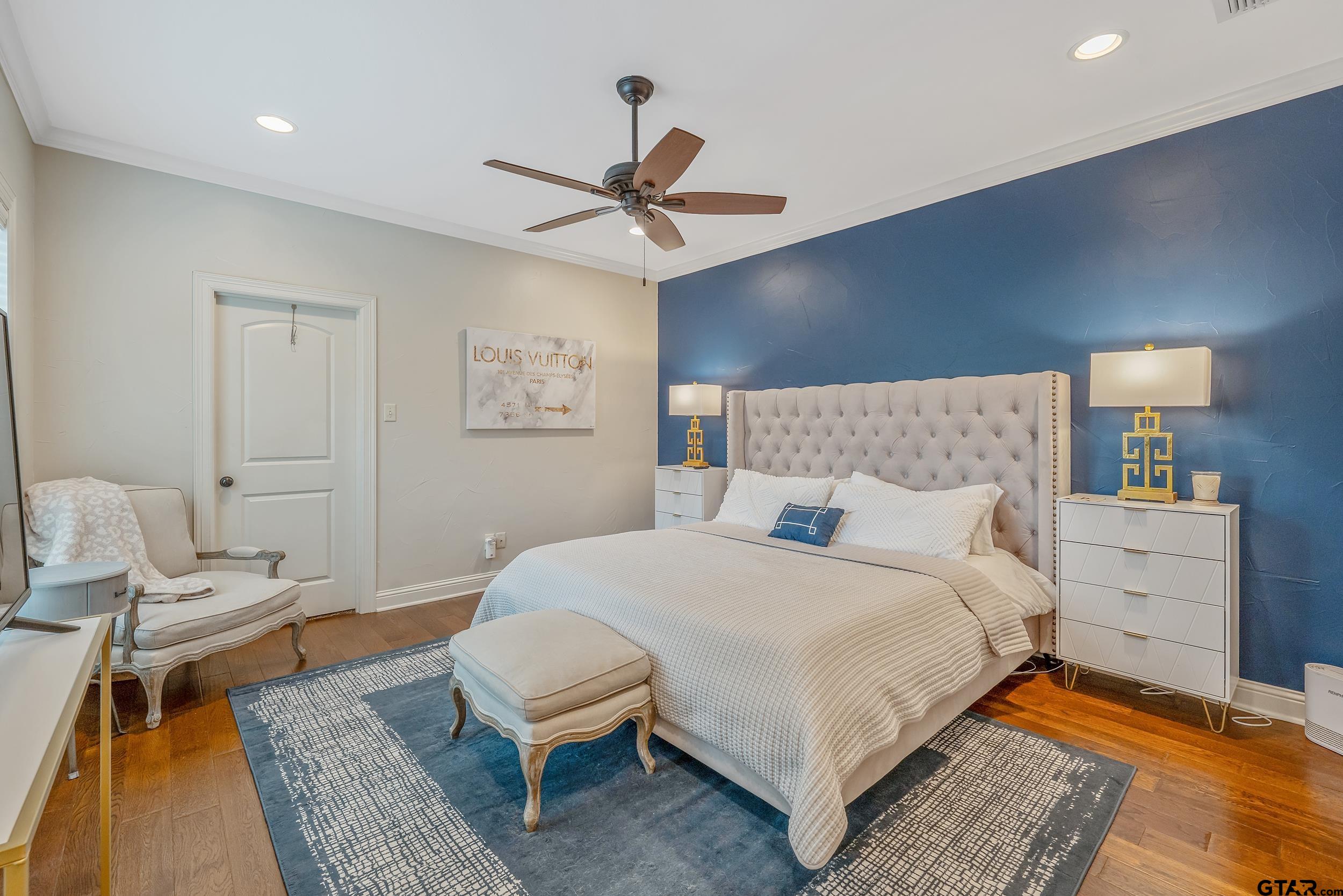 7216 Princedale Tyler, TX 75703 - Photo 15 of 27 a bedroom with a bed rug and dresser