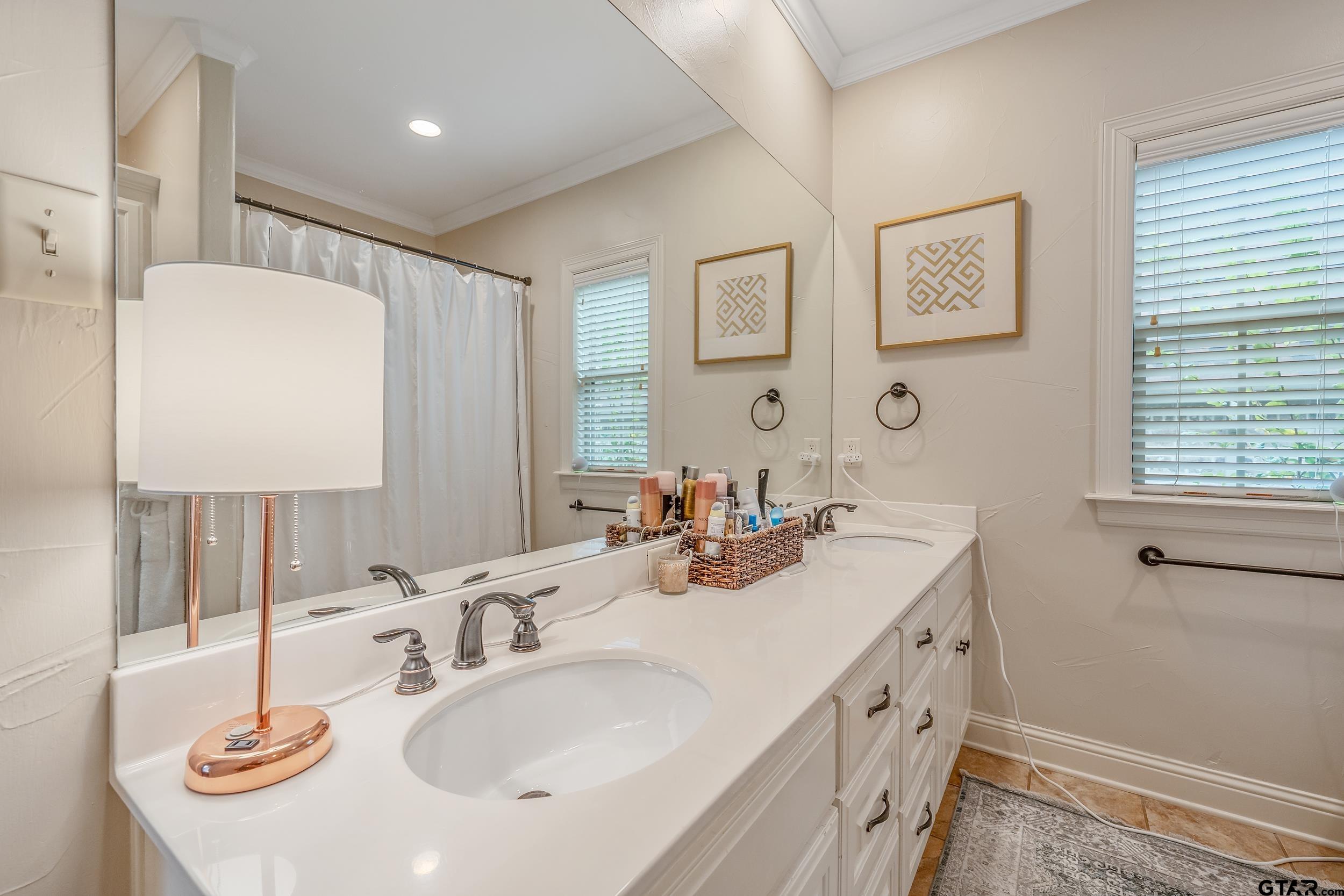 7216 Princedale Tyler, TX 75703 - Photo 17 of 27 a bathroom with a sink and a mirror