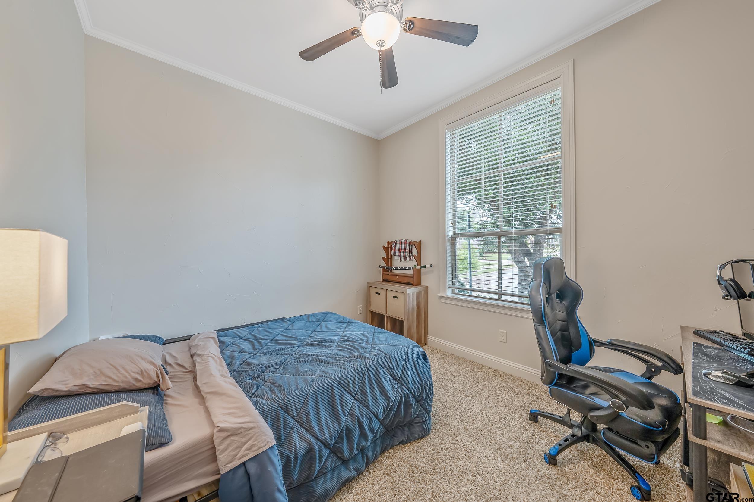 7216 Princedale Tyler, TX 75703 - Photo 19 of 27 a bedroom with bed and window