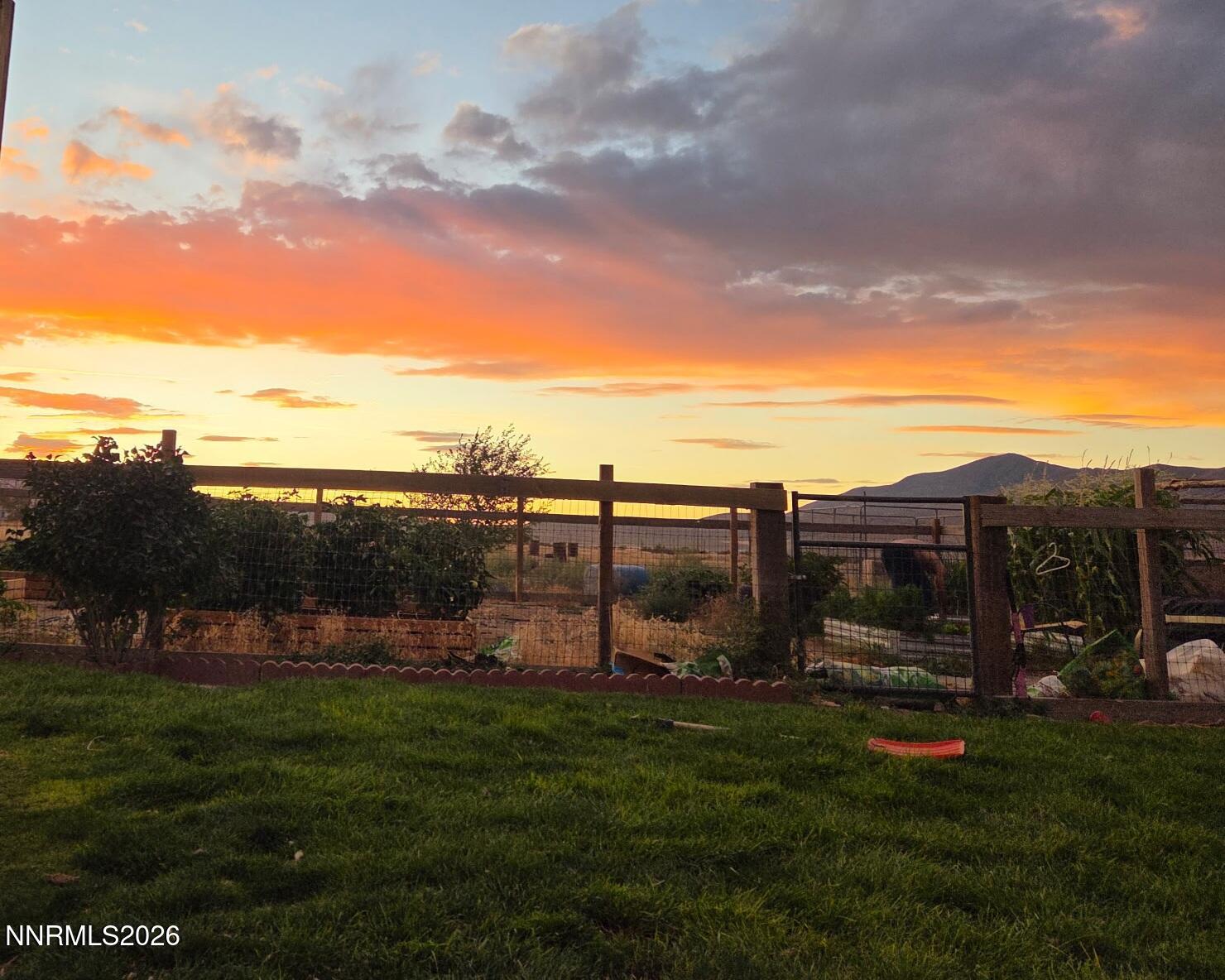 5355 Godchaux Road Winnemucca, NV 89445 - Photo 6 of 37 a view of a garden with lawn chairs