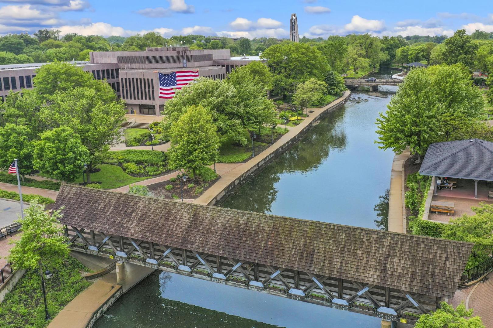 720 Jackson Avenue Naperville, IL 60540 - Photo 5 of 12 aerial view of a house with a yard and outdoor seating