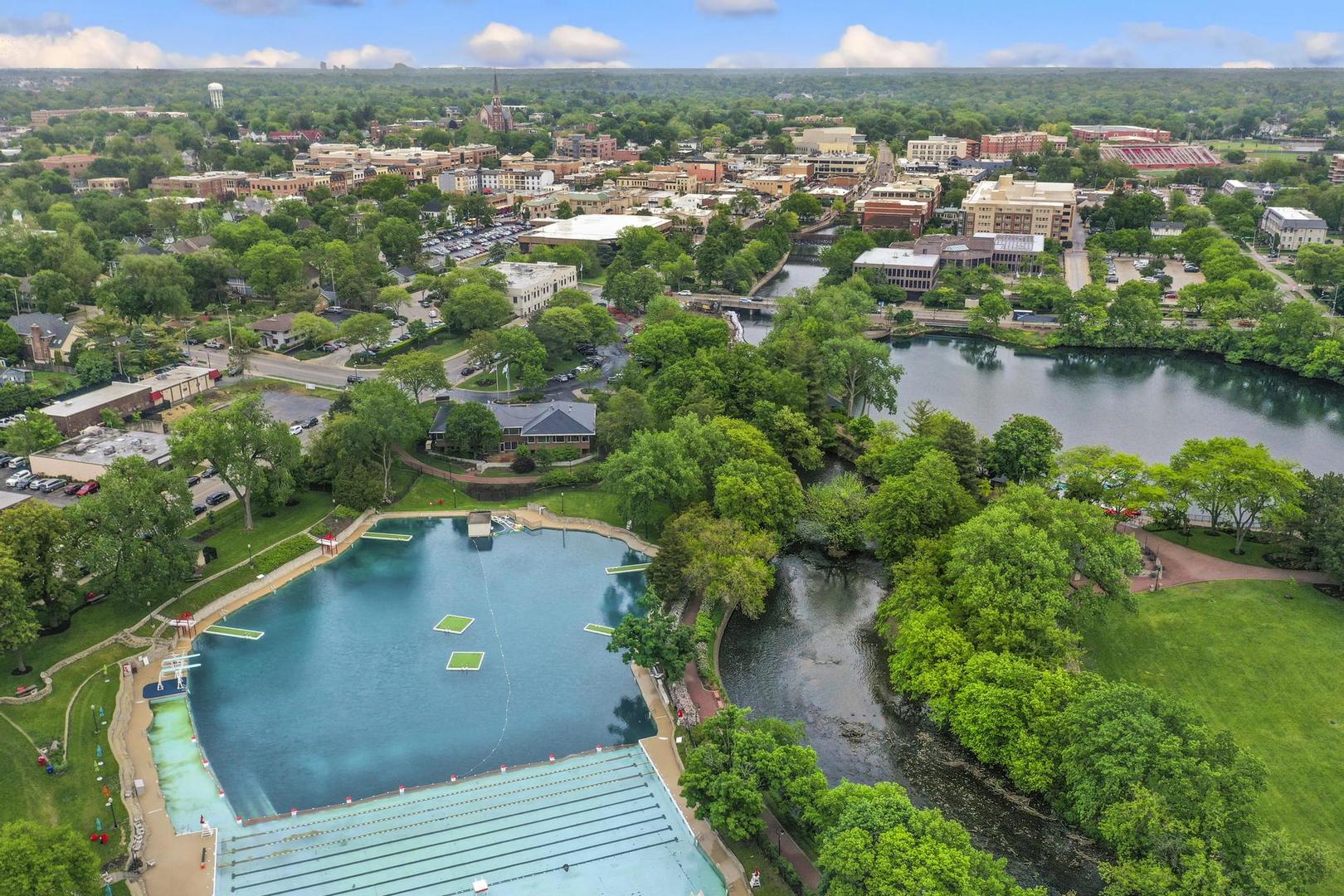 720 Jackson Avenue Naperville, IL 60540 - Photo 6 of 12 an aerial view of residential houses with outdoor space and river