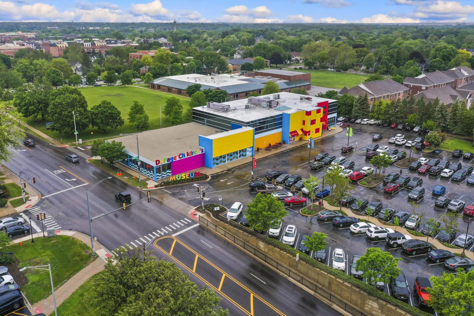 720 Jackson Avenue Naperville, IL 60540 - Photo 8 of 12 an aerial view of residential houses with outdoor space and street view
